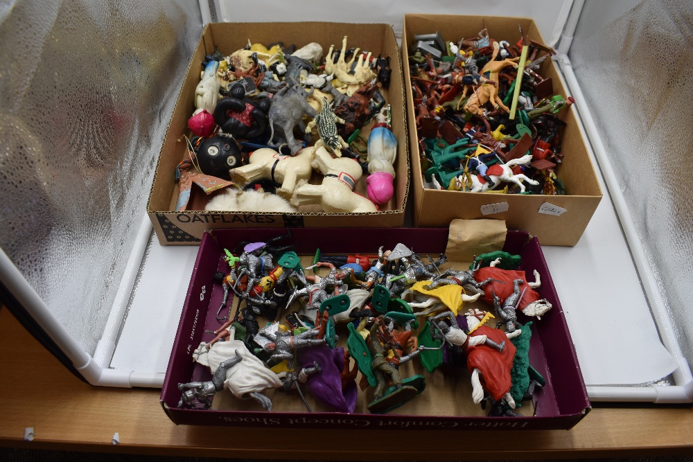 Three small boxes of Timpo, Cresent, Britains and similar plastic figures and animals including