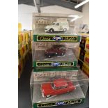 A collection of Sixteen Corgi Classic Models diecasts including Morris 1000 Van, Ford Popular