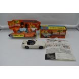 A Corgi diecast, James Bond Toyota 2000GT, in white with black interior, with bandit and driver