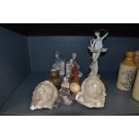 A selection of figures and figurines including Royal Copenhagen birds