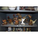 A selection of bird figurines including Royal Doultn doves.