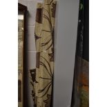 Two Dunelm mill blinds having beige ground with taupe and crimson tulip pattern.