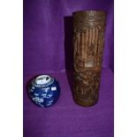 A hand decorated Chinese export ginger jar and similar carved bamboo brush pots