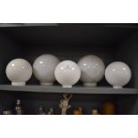 A selection of milk or opal glass light shades various sizes