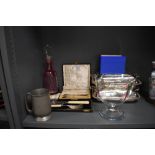 A selection of fine dinner wares including lidded serving dishes boxed cutlery and decanter