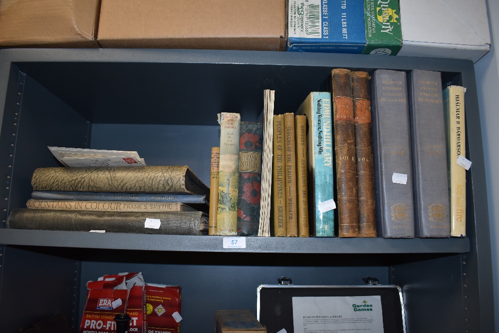 A shelf of antique and vintage books of cultural, wood turning interest,male and female anatomy