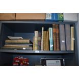 A shelf of antique and vintage books of cultural, wood turning interest,male and female anatomy