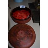 A selection of early red dyed bone games counters or pieces