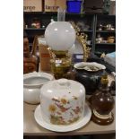 A selection of ceramics and lights including oil burning lamp cheese dome top and mirror
