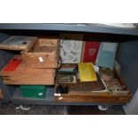 A collection of vintage art supplies and wooden boxes, including paints,pastels and sketch books