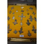 A fine selection of antique and later religious crucifix cross or pendant in various designs and