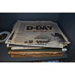 A selection of collectable newspapers with various famous headlines from the past
