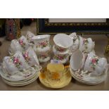 A selection of tea cups and saucers including Royal Albert Moss Rose and Grays Pottery