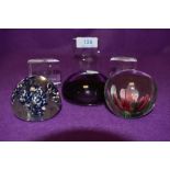 six paper weights, mixed styles,colours and designs.