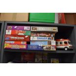 A selection of childrens puzzles and games also Playmobile Ambulance