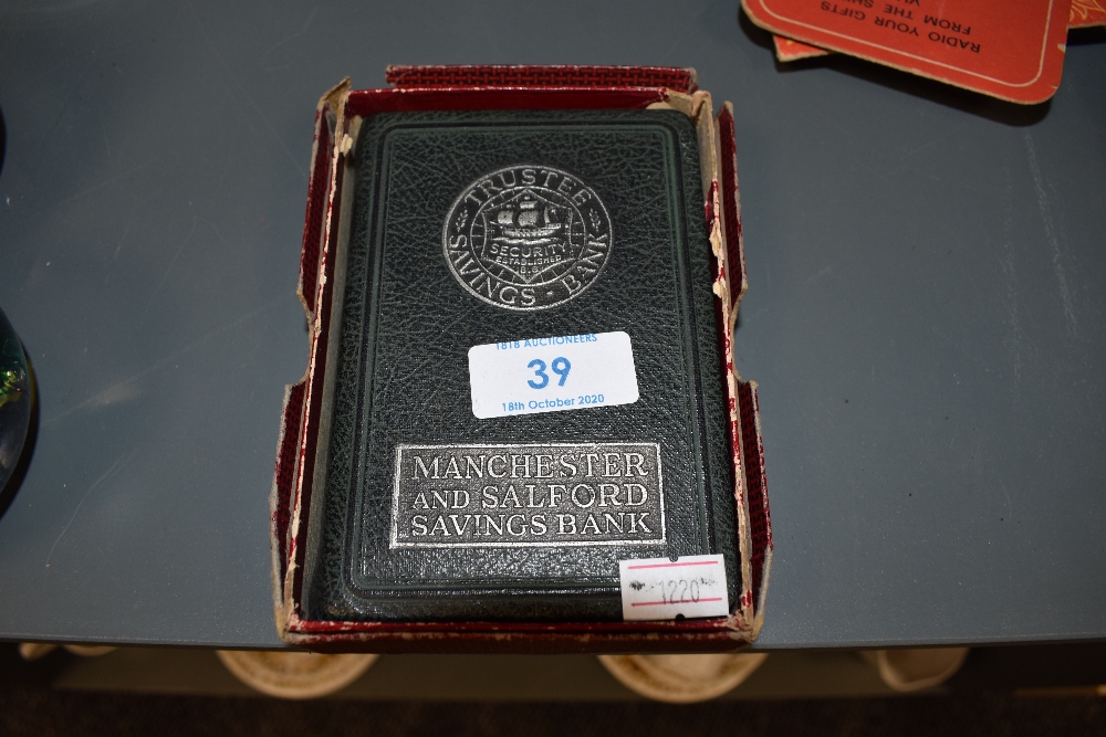 A Manchester and Salford penny savings bank in box