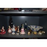 A selection of decorations including figures by Royal Doulton and Franz flower bell