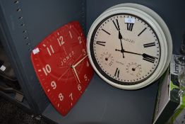 Two wall mounted kitchen clocks including Red Jones and French style