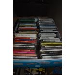 A box full of CD's , a real mix of genres ranging from funk and disco to rock , jazz and classical.