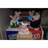 A selection of boxed Wade pig figure money boxes