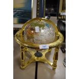 A modern Gemstone Globe having brass cradle and relevant documentation