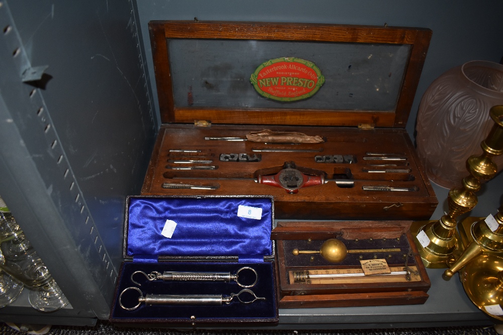 A New Preston mechanics or engineers tap and dye set in case also cased spring balance set