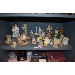 A collection of figurines of animal,childhood and fairy interest.