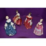 A selection of figurines of ladies in dress including Royal Doulton