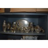 A collection of fine plated wares, amongst which are decorative trays and tea pots, champagne