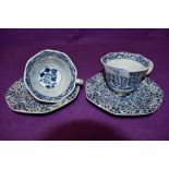 Two tea cup and saucer sets having early Chinese design transfer print with tin glaze stamped A.P to
