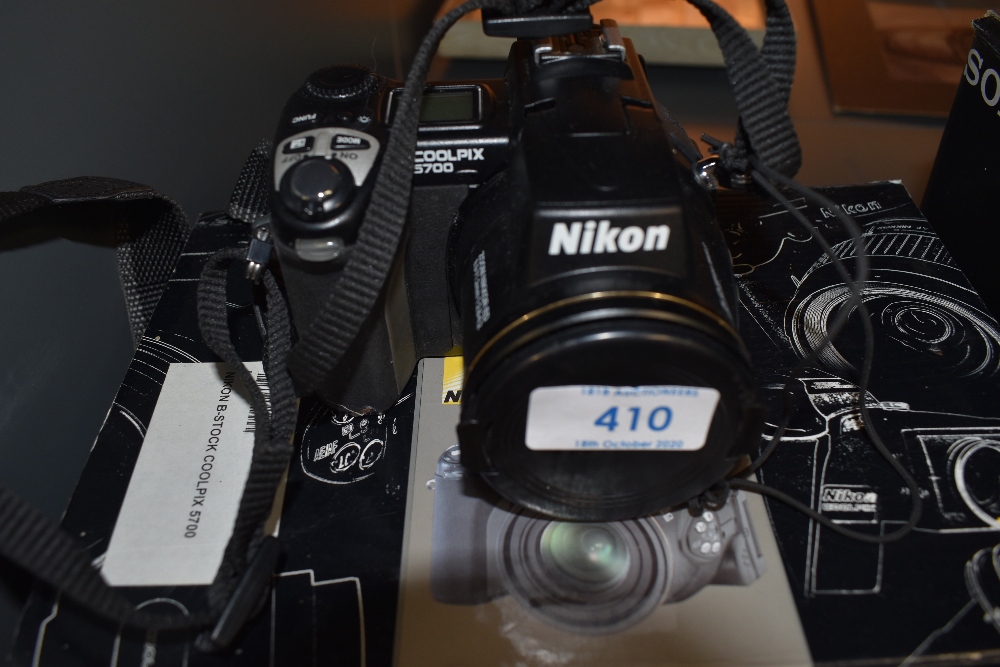 A Nikon Cool Pix 5700 digital camera in original box with charger etc