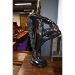 a vintage plaster cast figure of a nude woman by Austin productions 1979