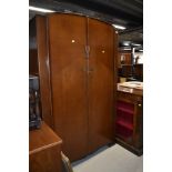 A mid 20th Century oak and ply wardrobe