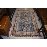 A traditional oriental style fireside rug, deep pile, approx. 183 x 107cm