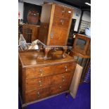 An Edwardian chest of two over two drawers and accompanying side cupboard