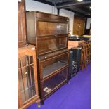 A vintage dark oak four tier stacking bookcase, labelled Gunn, width approx. 87cm, height 157cm