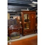 An Edwardian mahogany and inlaid two piece bedroom suite comprising mirror door wardobe and dressing