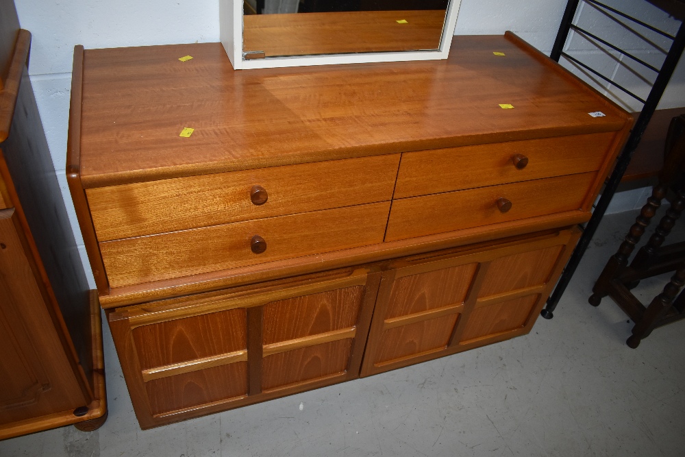 A vintage teak Nathan base unit, width approx. 102cm