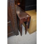 A Victorian mahogany sutherland style table on turned legs, restoration project