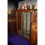 An early 20th Century bookcase, width approx. 85cm