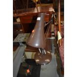 A vintage angle poise lamp, in brown
