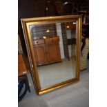 A gilt frame wall mirror, 75 x 106cm