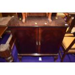 A period style mahogany TV cabinet on cabriole legs, approx width 82cm