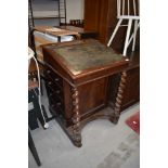 A 19th Century mahogany davenport , in need of restoration but looks sound