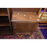 An Edwardian oak pot or bedside cupboard