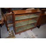 A vintage sapele bookcase, on dansette style legs, width approx. 92cm