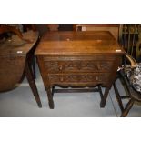 A traditional oak two drawer side chest, width approx. 64cm