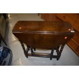 A nice quality traditional oak gate leg table, having bobbin turned legs, good proportions being