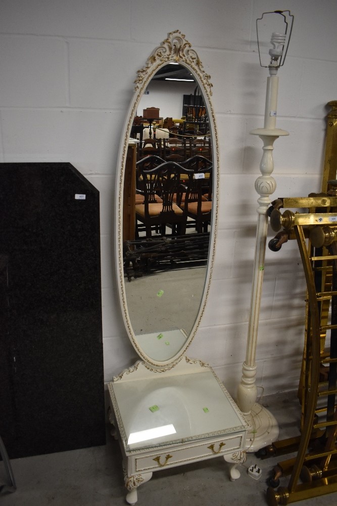 A vintage Cheval mirror on drawer base, in the French style