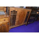 An early to mid 20th Century walnut display cabinet, width approx. 120cm